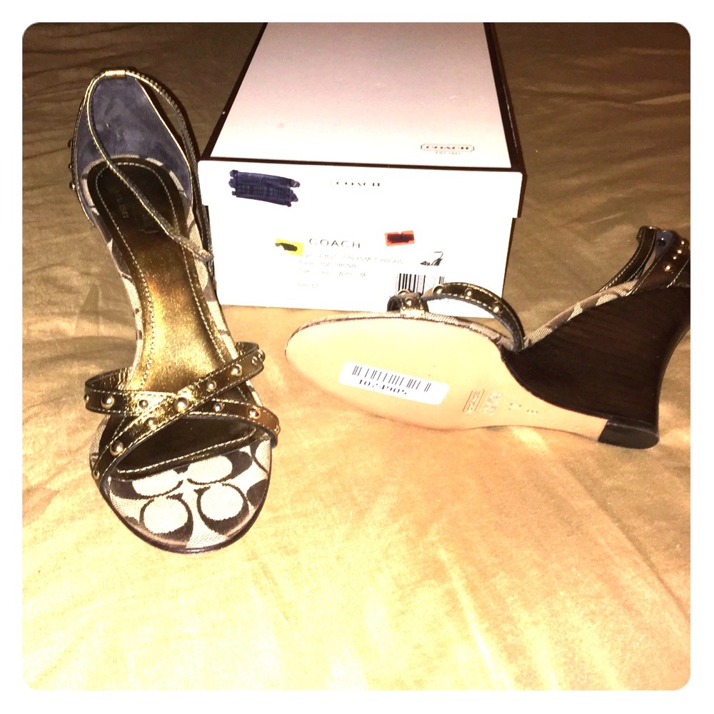 Brand new never worn Authentic Coach Wedges
